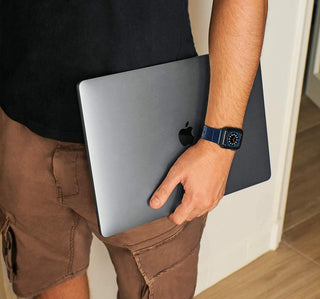 man with blue cocodirle band for apple watch