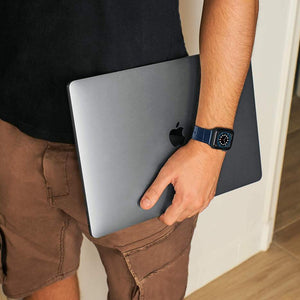 man with blue cocodirle band for iwatch